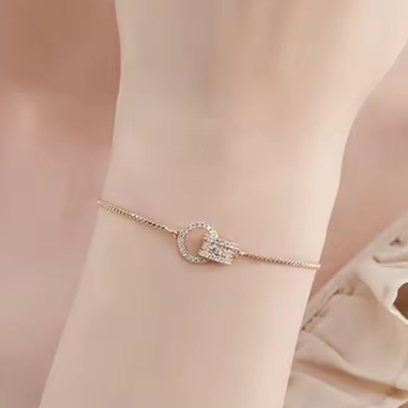 Anthropologie Jewelry - Anthro adjustable Gold Bracelet with Heart Clasp